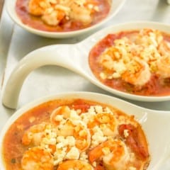 3 white small baking dishes holding Baked Shrimp with Tomatoes and Feta