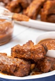 White platters filled with Braised Baby BBQ Sauce