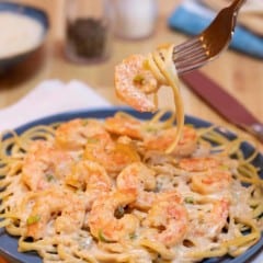 Blue plate filled with Quick and Easy Cajun Shrimp Linguine