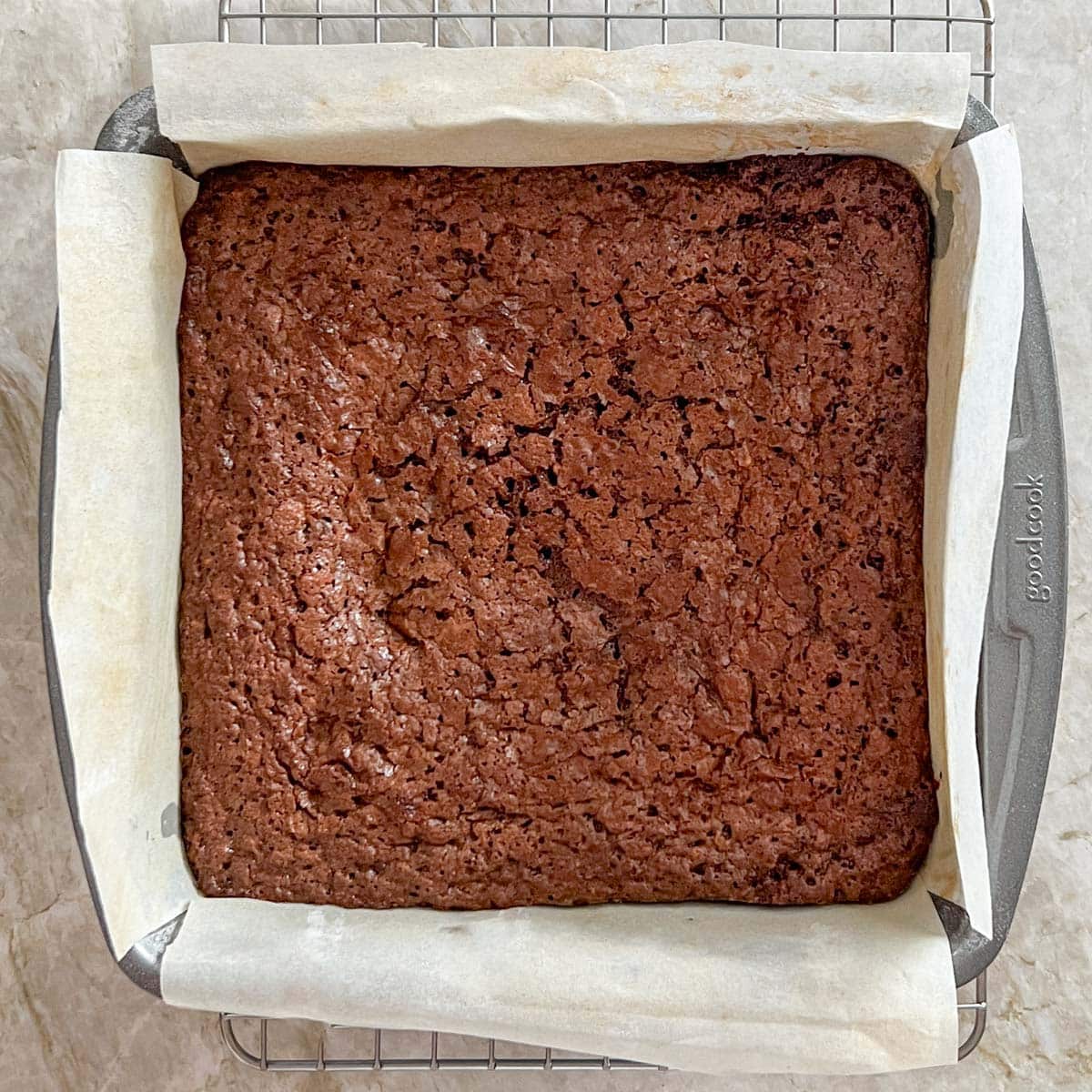Finished brownies still in pan, cooling on a wire rack