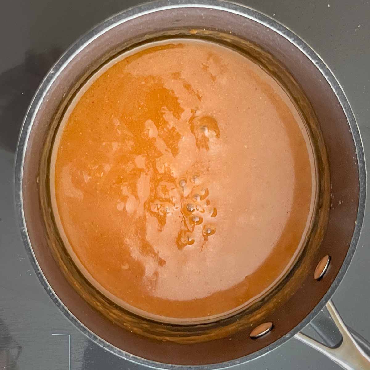 Green chile sauce boiling, before addition of chiles and yogurt