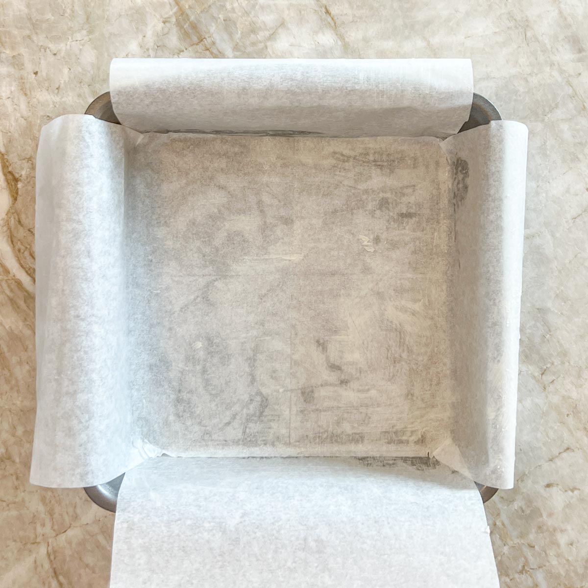 Baking pan lined with parchment paper