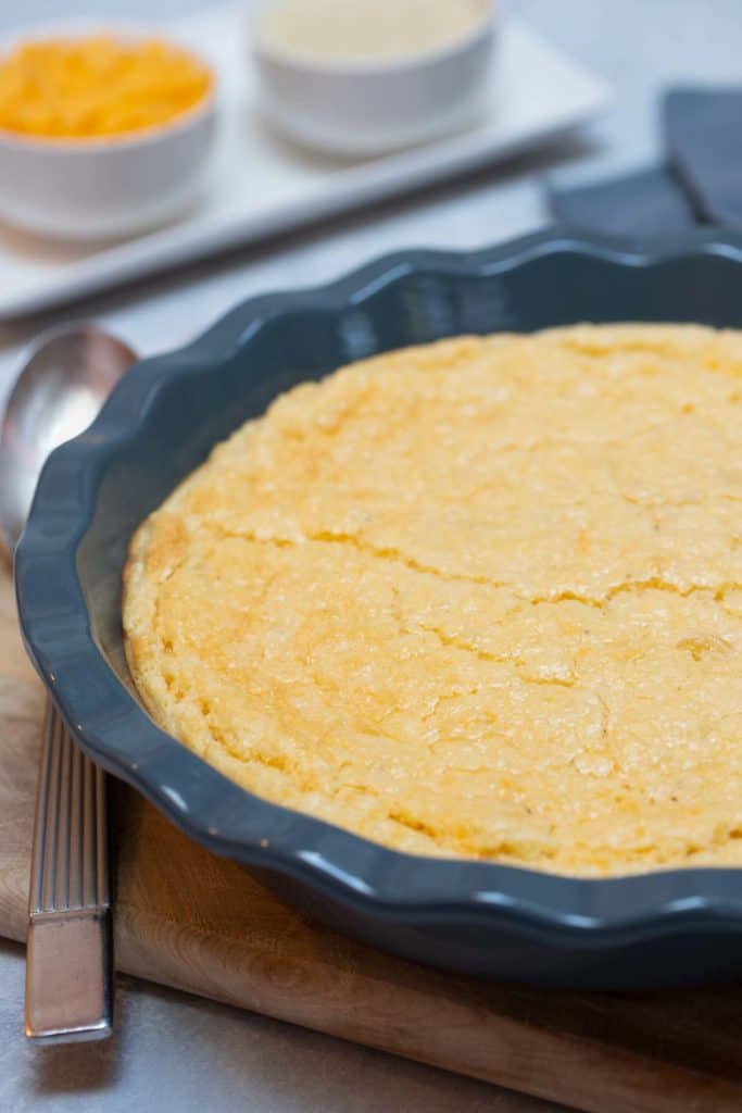 Dark blue pie dish filled with Convent Pie