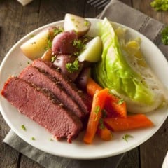 white plate with Mom's Corned Beef and Cabbage