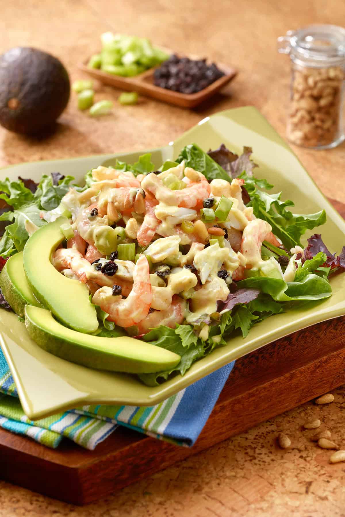 Square green plate filled with Crab and Shrimp Salad with Curry-Chutney Dressing