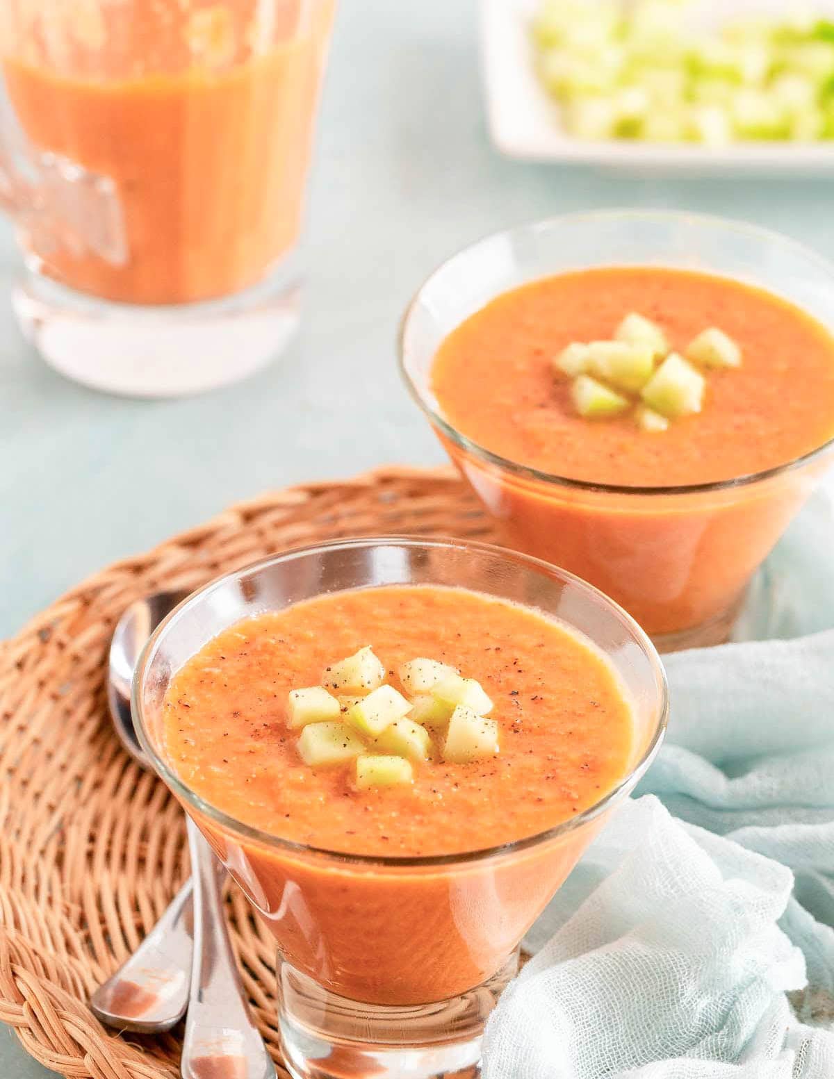 Two clear glasses showing individual portions of Easy Gazpacho Recipe
