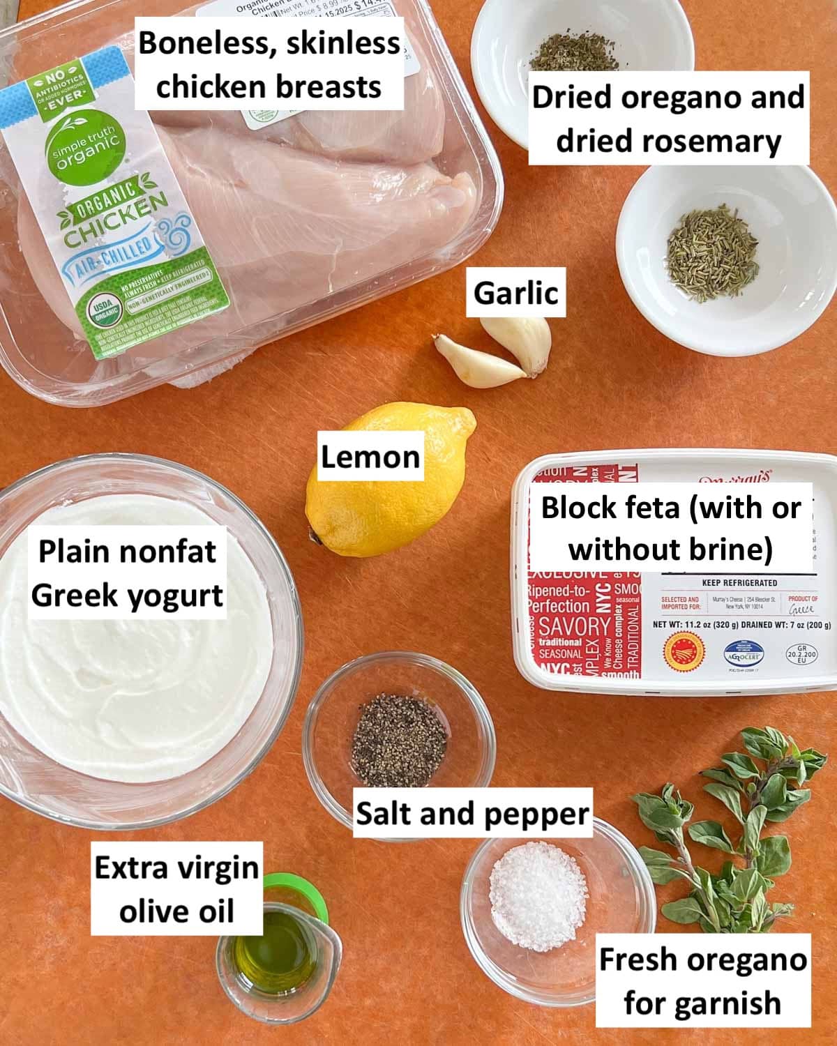 Feta Chicken ingredients laid out on a cutting board and labeled