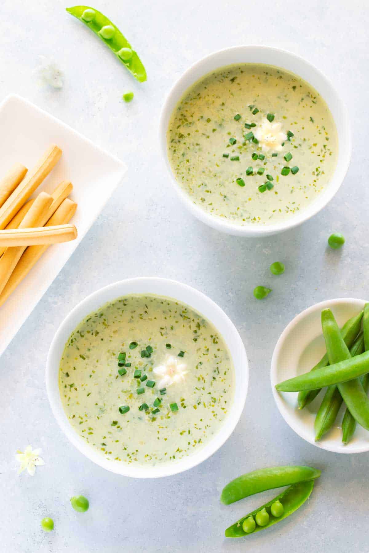 overhead shot showing 2 servings of Pureed Green Pea Soup
