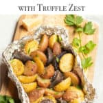 Foil packet filled with grilled new potatoes, seasoned with Parmesan Cheese, parsley and truffle zest.