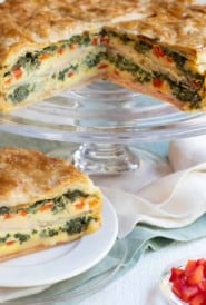 Ham, Cheese and Spinach Torte with piece in front