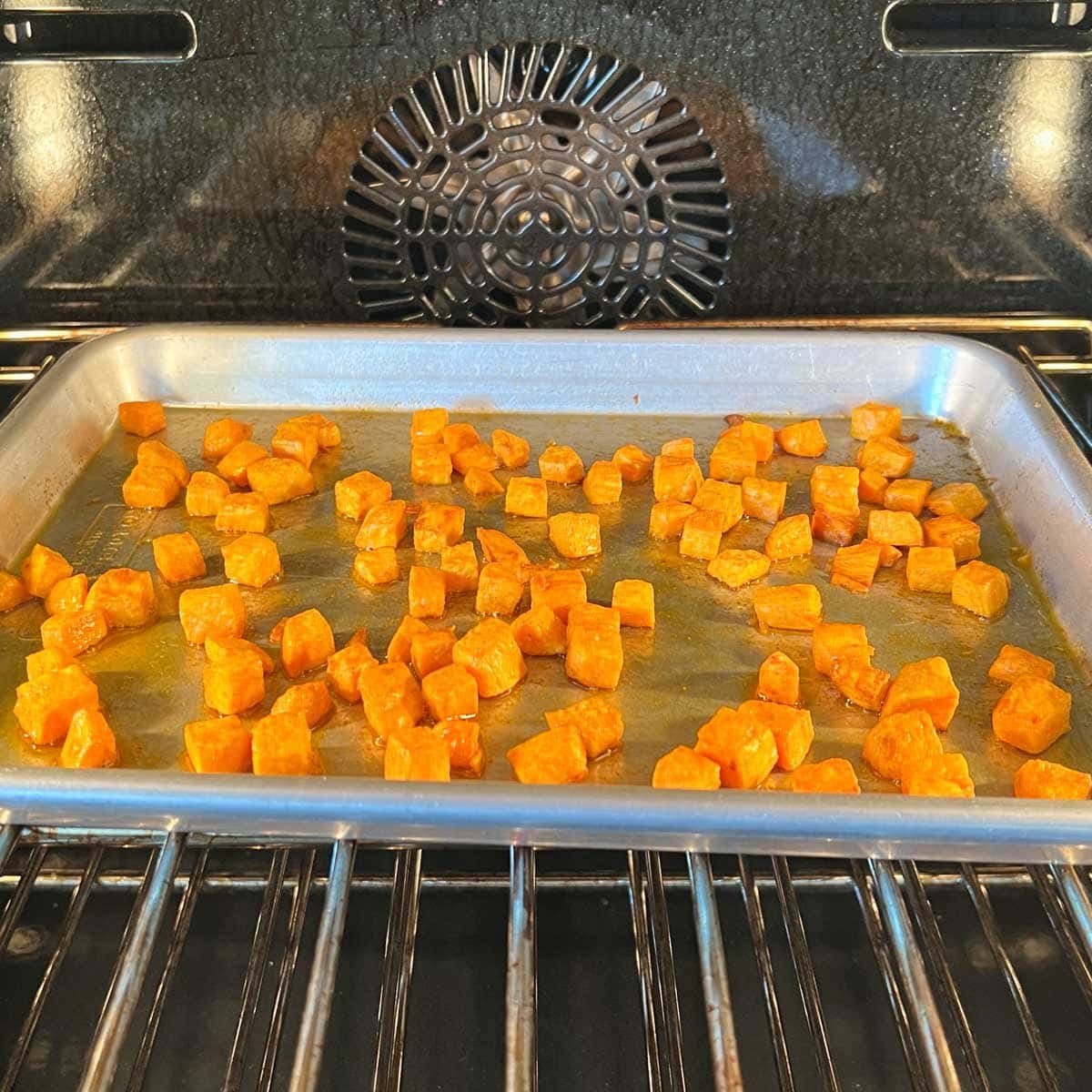 Sweet potato croutons for Healthy Broccoli Soup roasting in oven
