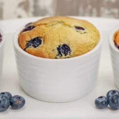 white ramekin filled with Individual Blueberry Cake