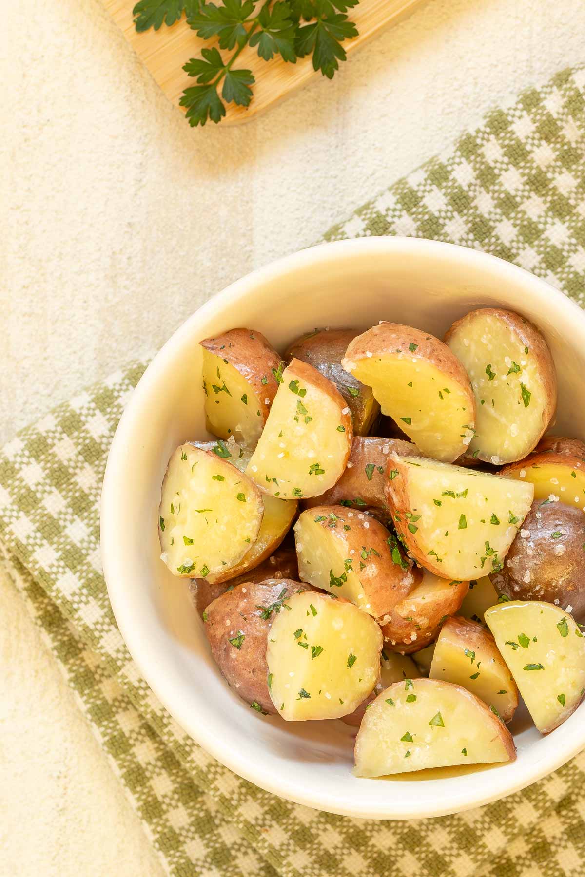overhead shot of white bowl holding Instant Pot New Potatoes