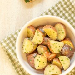 overhead shot of white bowl holding Instant Pot New Potatoes
