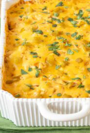 View of Layered Chicken Enchilada Casserole showing cilantro garnish on top