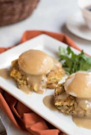 White platter with Leftover Thanksgiving Stuffing and Gravy Eggs Benedict
