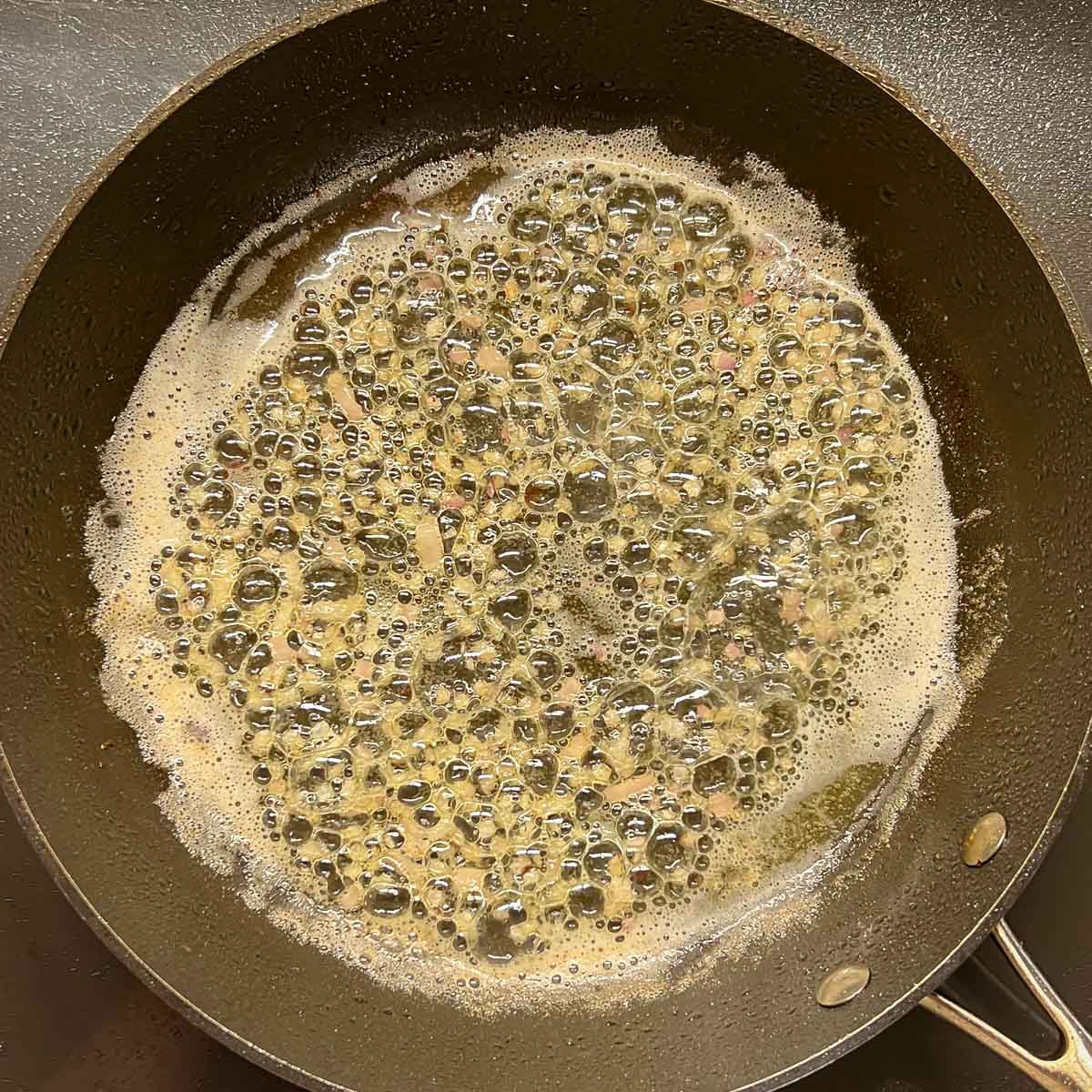 Shallots cooking in oil and butter