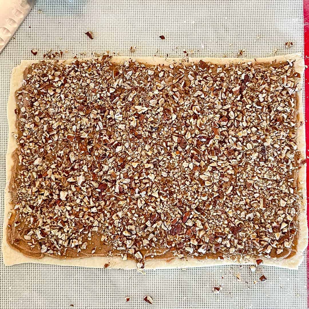 overhead viiew showing butter and pecan filling on pastry