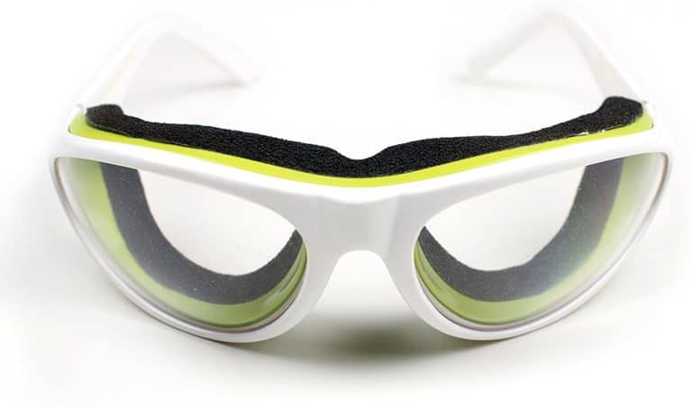close up of white, black and green onion goggles