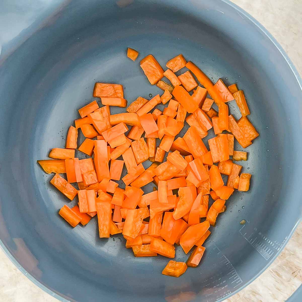 Process shot of 1 bell pepper, coarsely chopped for the stuffing