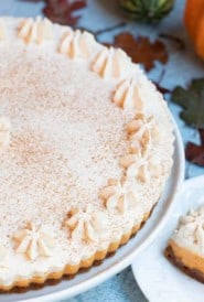 overhead shot of Rum Pumpkin Tart with a slice on the side