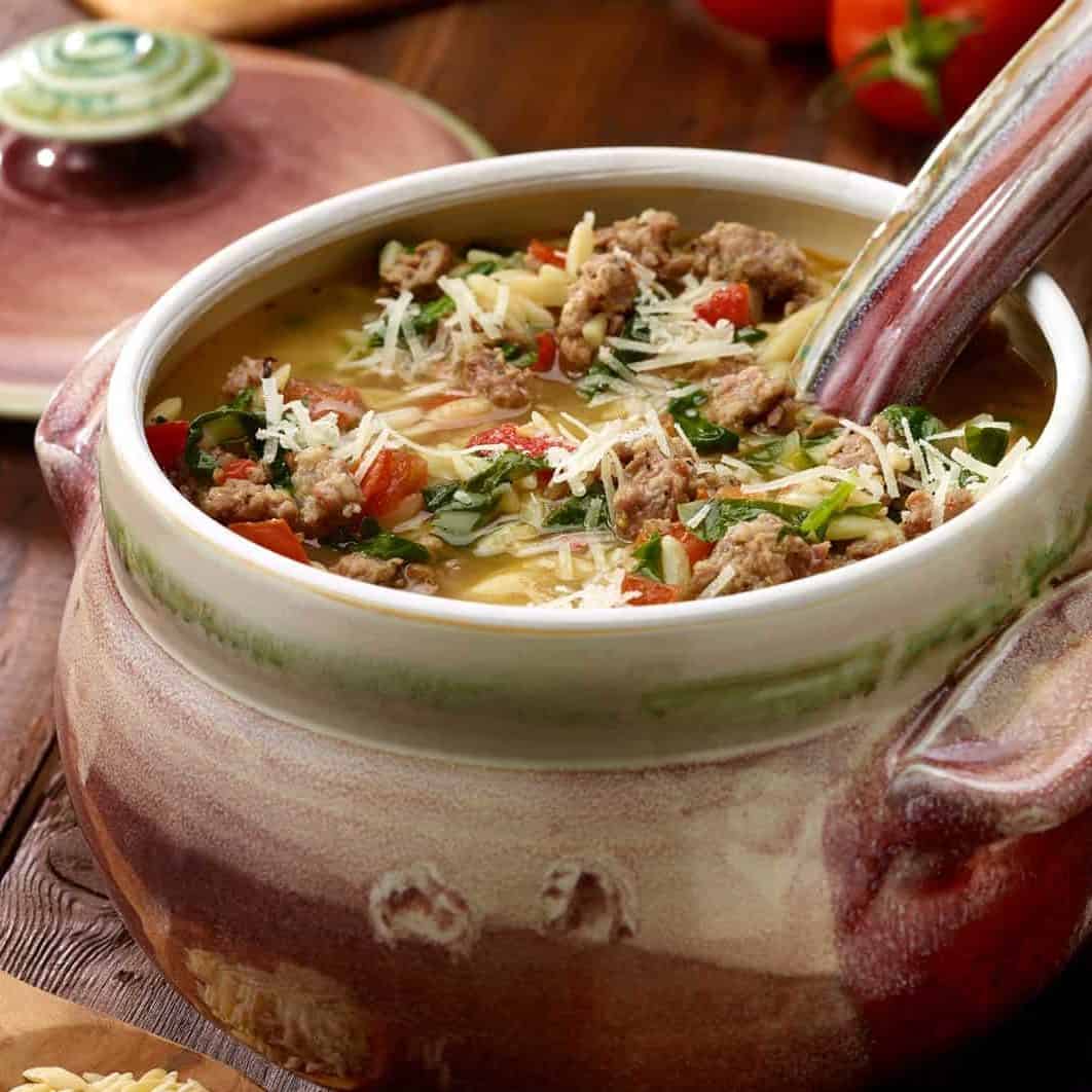 ceramic soup turreen filled with Sausage, Spinach and Orzo soup