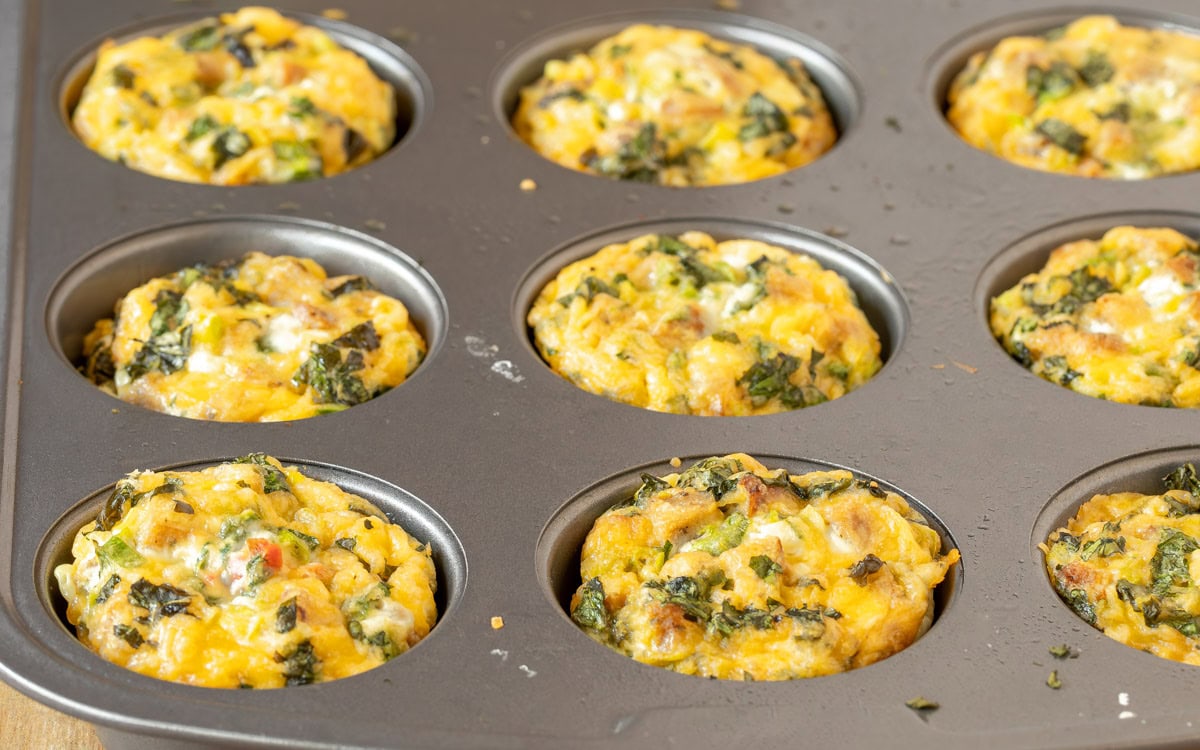Nine Sausage, Egg and Cheese Muffins in muffin pan