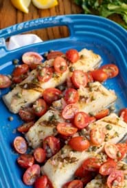 Blue platter with Sea Bass and Tomatoes in Lemon Butter Sauce