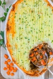 overhead shot of Shepherd's PIe, with a corner scooped out showing the filling