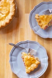OVerhead showing two slices of Southern Tomato PIe, with rest of pie partially shown on the left