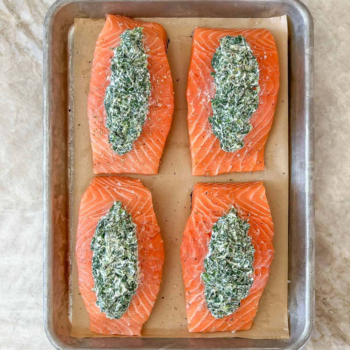 Process shot showing what stuffing in salmon looks like uncooked