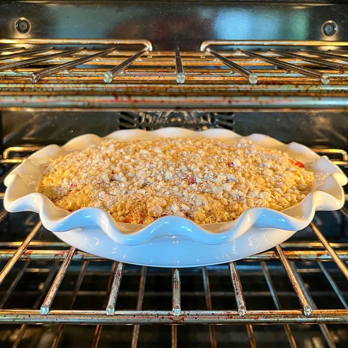 Strawberry Rhubarb Crisp beginning to bake in oven