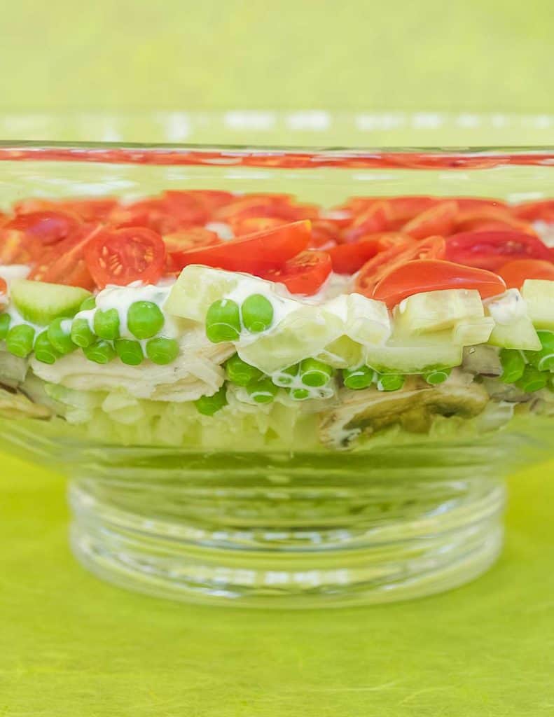 glass bowl showing layered version of Tarragon Chicken Salad